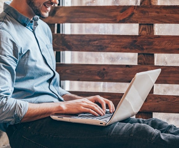 man working on laptop