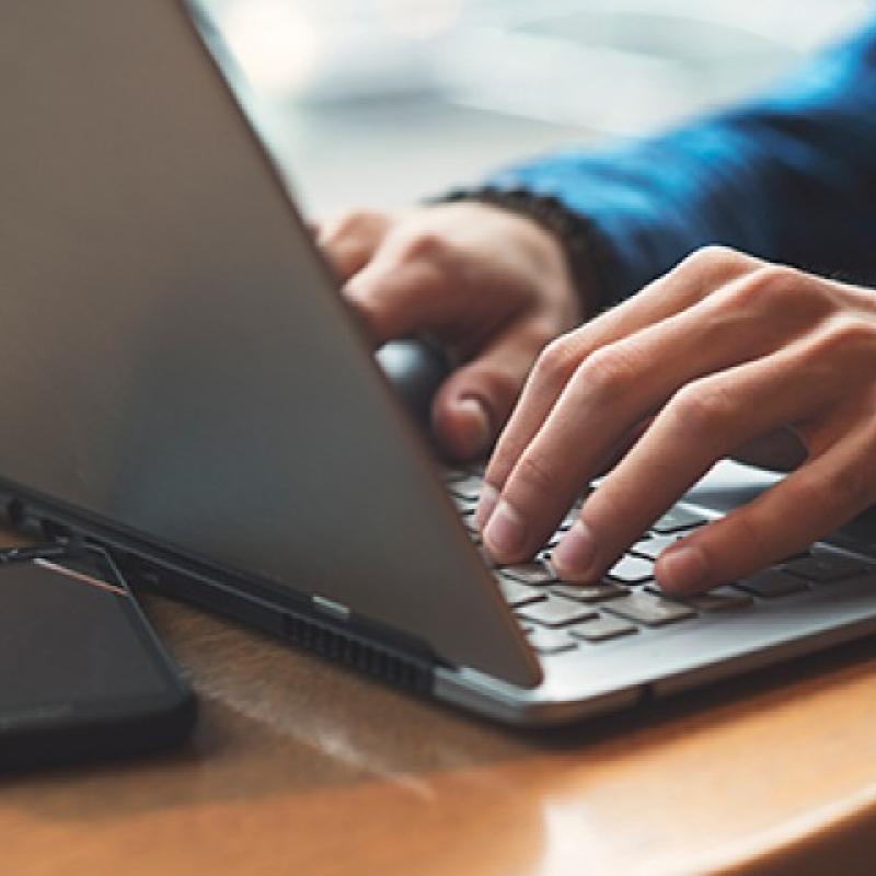 close up hands typing